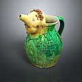 Green Ceramic Pitcher with Decorative Head Mane Relief Carvings Spout and Handle