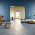 Modern Sofa and Coffee Table Set with Blue Walls Yellow Accent and Natural Light