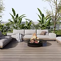 Outdoor Sofa on Wooden Patio with Fire Pit and Lush Green Plants