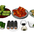 Assorted Traditional Asian Food Including Rice Dumplings Seaweed Rolls And Steamed Pastries
