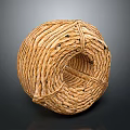 Handmade Natural Brown Coiled Twine Ball With Textured Surface And Craft Design