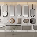 Various Shapes of Modern Mirrors on Wall with Decorative Plant in Room