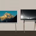 Two Televisions Showing Mountain And Moon Scenes On Wooden Stands With Light Wall