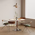 Modern Minimalist Dining Space With Round Table Green Beige Cushioned Chairs Pendant Light And Window Blinds