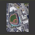 Aerial View of Baseball Stadium Green Turf Red Mound Surrounded by Urban Buildings and Streets