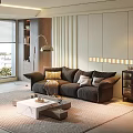 Modern Dark Sofa With Plush Pillows And White Marble Coffee Table In Living Room