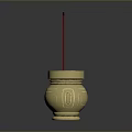 Golden Decorative Incense Burner With Three Red Incense Sticks On Dark Background
