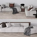 Light Gray Sectional Sofa With Brown Gray Pillows Knit Throw Blanket And Side Table