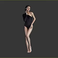 Stylish Woman In Black One Shoulder Bodysuit Standing On Black Floor With Gray Background