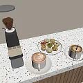Coffee Grinder With Coffee Beans Latte Art Coffee Cups And Pastries On Speckled Countertop