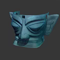 Ancient Bronze Mask Sculpture With Unique Facial Features And Cultural Design