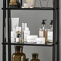 Modern Bathroom Shelf Unit With Toiletries Towels Candles And Decorative Bottles