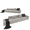 Modern Cream Sectional Sofa with Brown Throw Pillows and Soft Throw Blanket 3d model