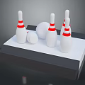 Bowling Pins And Ball Display On White Platform With Red Stripes