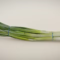 Fresh Green Onions Bunch With Vibrant Green And White Stalks On White Background