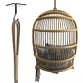 Cozy Rattan Hanging Chair With Gray Cushions And Soft Blanket For Indoor Decor