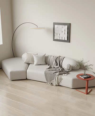 Cozy Modern Living Room with Irregular-Shaped Sofa Pillows Blanket Floor Lamp and Red Side Table 3d model