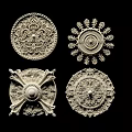 Intricate Carved Decorative Pieces With Circular Patterns And Ornate Floral Designs