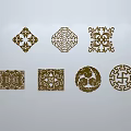 Traditional Carved Sculptures With Various Shapes And Decorative Patterns On White Background