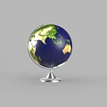 Decorative Globe Ornament Featuring Blue Ocean Green Land and Silver Base for Home Decor