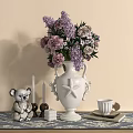 White Vase Purple Pink Flowers Koala Figurine Candles Decorative Ornament Set On Patterned Table Runner