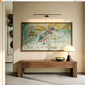 Abstract Painting on Beige Wall with Wooden Table Lamp Fruit Bowl and Black Circular Decorations