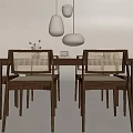 Modern Wooden Dining Table Set With Woven Back Chairs And White Pendant Lights