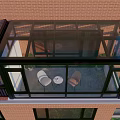 Glass Sunroom Attached To Red Brick Building With Black Frame And Glass Windows