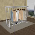 Stainless Steel Clothes Rack With Hanging Clothes And Shoes On Carpet In Room