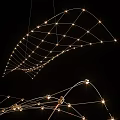 Modern Net Like Chandelier With Metal Lines And Warm White Lights For Dining Room