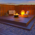 Outdoor Garden Landscape With Wooden Patio Sofa Chair Fire Pit And Lit Lantern