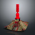 Traditional Architectural Structure With Red Spire And Multi Layered Straw Like Roof