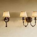 Wall Lamps With White Pleated Shades And Metal Base On Beige Wall