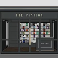 The Pavilion Store Black Facade With Golden Decorative Columns Glass Doors And Colorful Product Shelves