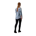 A Woman Wearing Striped Tank Top Denim Shirt Black Pants And Boots