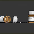Medical Devices Including Medicine Bottles With Scattered White Tablets And Labels