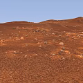 Martian Ground With Red Sandy Surface And Ridges Covered In Rocks 3d model