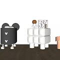 Black And White Decorative Cabinets With Drawers Wheels Cubes Figurine And Cards On Wooden Floor