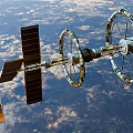 Wheel Shaped Space Station Orbiting Earth With Cloudy Skies 3d model