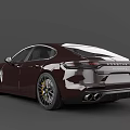 Burgundy Porsche Luxury Sedan With Sleek Sporty Design And Alloy Wheels