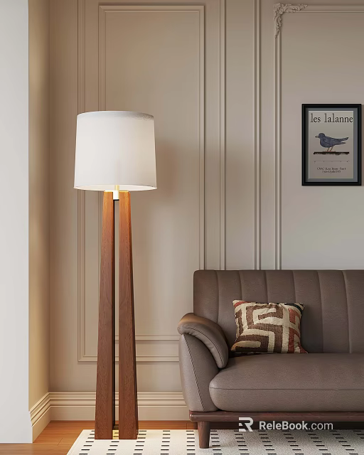 Cozy Living Room With Wooden Floor Lamp White Shade Brown Sofa And Geometric Pillow 3d model 