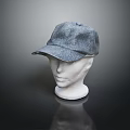 Gray Fabric Baseball Cap Showcased On Mannequin Head With Structured Brim Against Dark Background