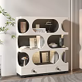 Modern White Bookshelf with Open Compartments Holding Books Decorative Lamp and Vase