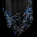 Stylish Chandelier With Blue And Transparent Featherlike Decorations Hanging On Black Background