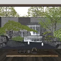 Rockery Stones with Waterfall and Green Plants in Zen Garden Wooden Platform and Tea Set