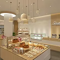 Modern Dessert Shop Interior With Glass Display Cases Wooden Decor Baked Goods And Pendant Lights