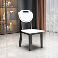 Modern Black and White Dining Chair with Round Backrest and Minimalist Design