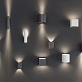 Modern Wall Lamps With Various Shapes And Lighting Effects On Dark Wall
