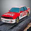 Red and white racing car with BASTOS MOTUL logos number 83 on track surface