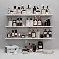 Household Essentials Display on Organized Shelves with Various Bottles Jars Towels and Candles